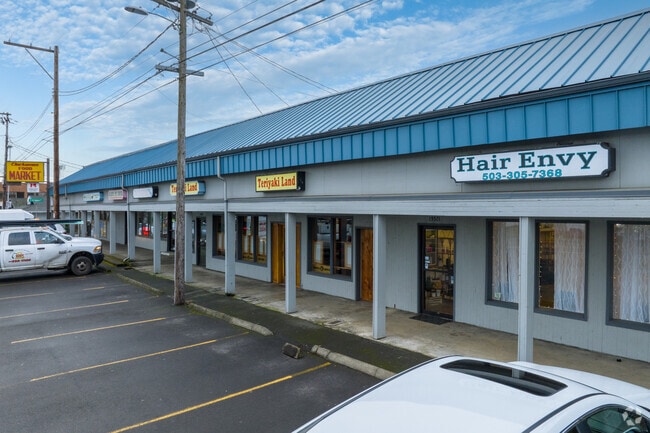 A local strip mall offers shopping and dining options for the Clackamas community.