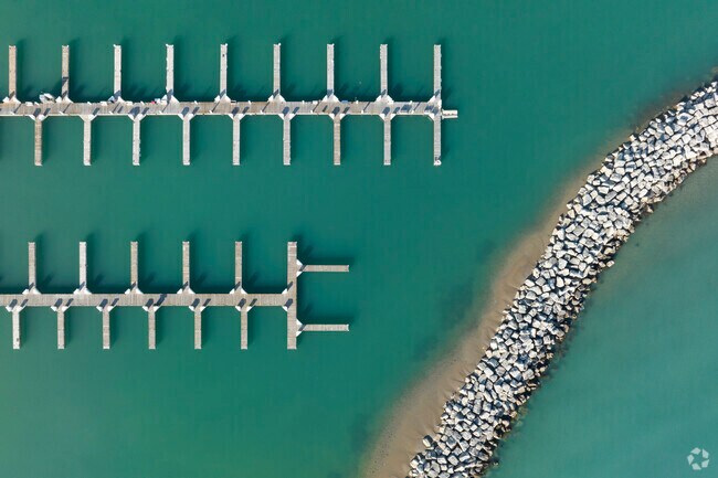 The Kenosha harbor and wave break is beautiful as seen from above on Lake Michigan.