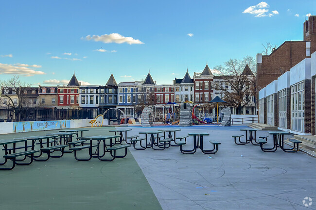 Benches and playground at Tubman Elementary School