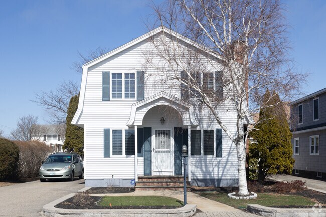 This charming gambrel home, with its distinctive double-sloped roof, adds a touch of classic coastal character to the landscape of Seabrook Beach.