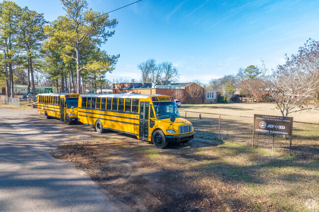 Buses line up to take kids to Lipscomb Elementary School.