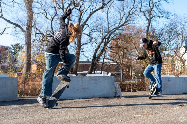 Teenagers find many ways to have fun throughout the city, including skateboarding.