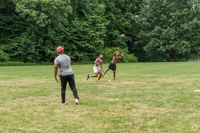 A coach gives additional training to football players at Brandywine Park.