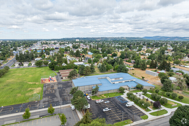 Arlington Elementary has a small parking lot for staff in front of the school.