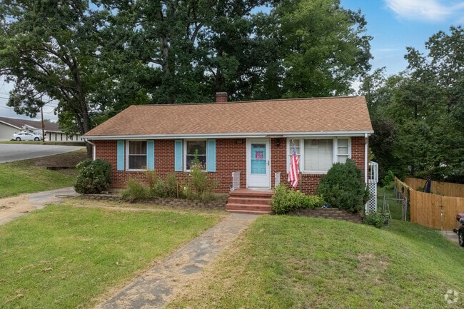 Many ranch-style homes in the neighborhood have charming brick exteriors.