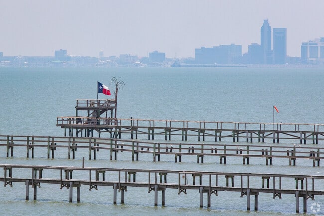 Reel in a big fish when fishing along the Corpus Christi Bay piers in Portland, Texas.