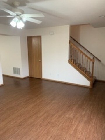 Living room view - storage under the stairs