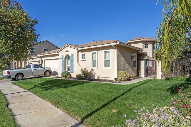 Grassy front yards are typical of homes in Bellevue Ranch.