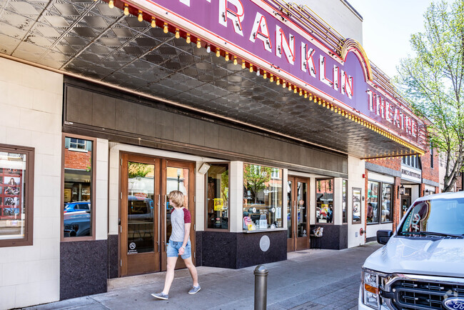 People Walking Past the Front Entrance of the Franklin Theater in the Historic Downtown Franklin Neighborhood