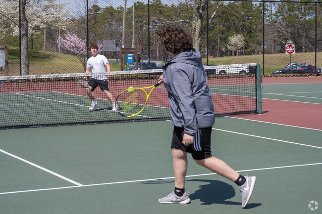 You can play tennis at Quinsigamond State Park in Worcester.