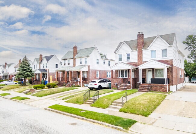 Many duplexes in Graceland Park have small front porches.
