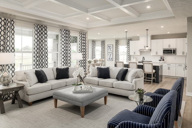 Oversized kitchen island, tray ceilings, quartz or granite countertops—all this and more can be yours without splurging on a custom home.