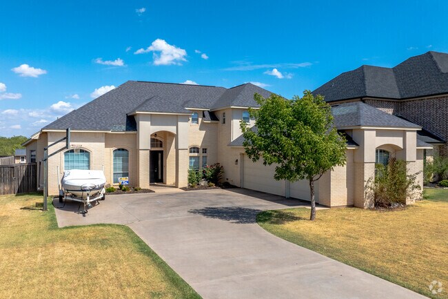 Some Stone Lake Estates homes have large driveway that residents can use to park a boat.