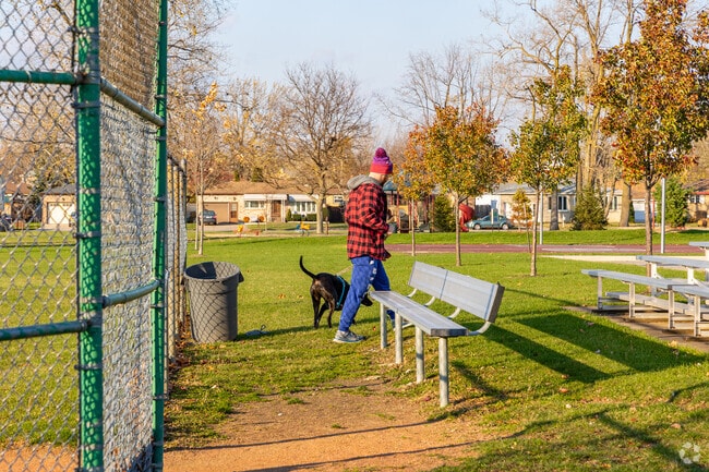 South Cheektowaga locals walk their dogs at the spacious parks in the neighborhood.