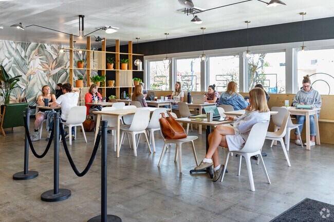 Catch up with friends over a coffee at Lima Coffee Roasters near Registry Ridge.