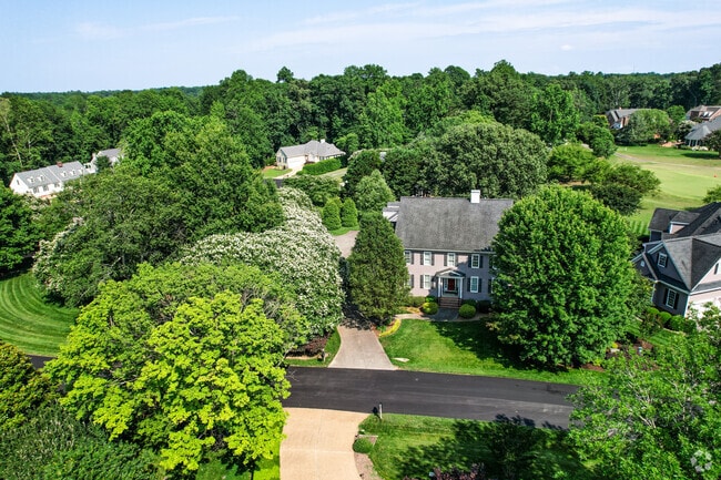 Ford’s Colony offers large wooded lots that create privacy, quiet, and a tucked-away feel throughout the community.