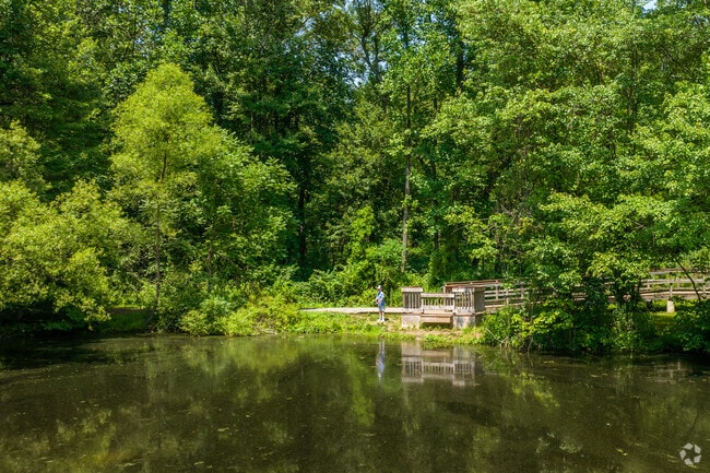 Resident kids and adults visit the pond at East Fallowfield Community Park to fish.