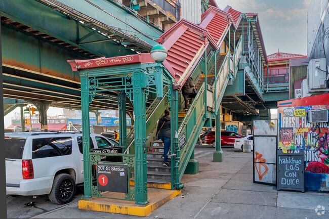 Subway Station #1 is in the downtown train & platform in Washington Heights, NY.