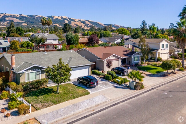 Spacious homes with beautiful landscaping define Evergreen Estates.