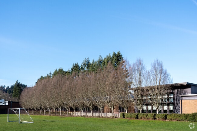 The side view of the school featuring a covered patio.