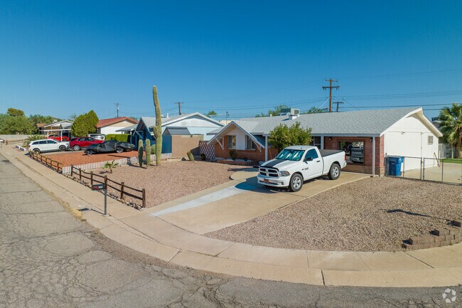 Enchanted Hills homes are typically landscaped with gravel.