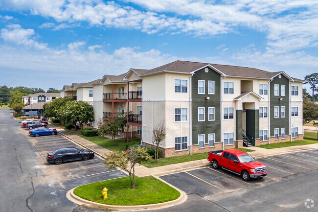 Professionally Maintained Landscaping Surrounds the Property
