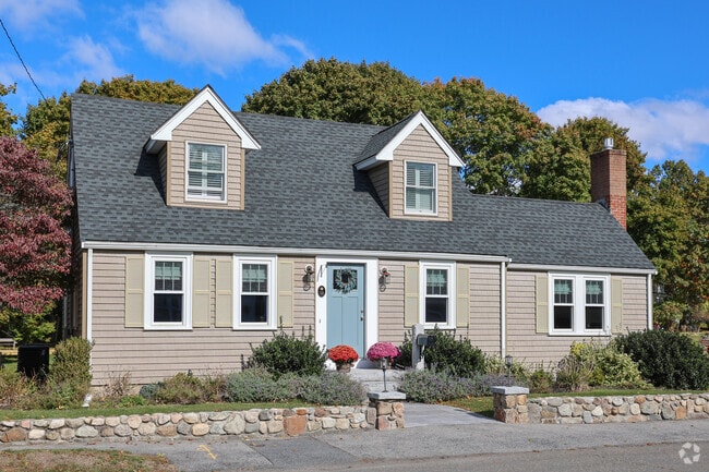 Traditional Cape Cod style homes live on large lots in Beverly Cove