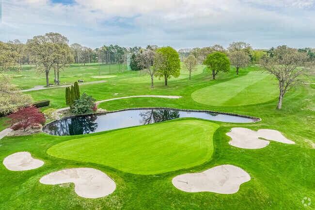 Perfectly manicured fairways greet the golfers at the Muttontown Club.