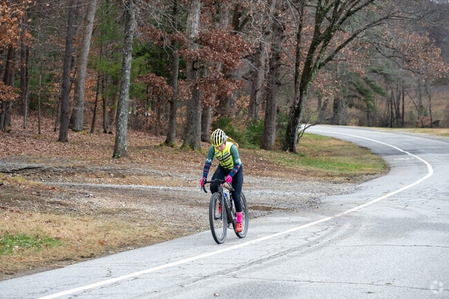 Bicyclists enjoy riding the trails at Country Park, near Whitehall.