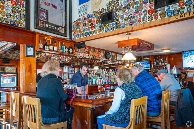 South Yarmouth residents enjoy dinner with friends at Captain Parker's Pub.