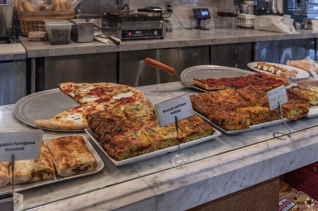Savor delicious pizza at the Conner Deli in Long Hill.