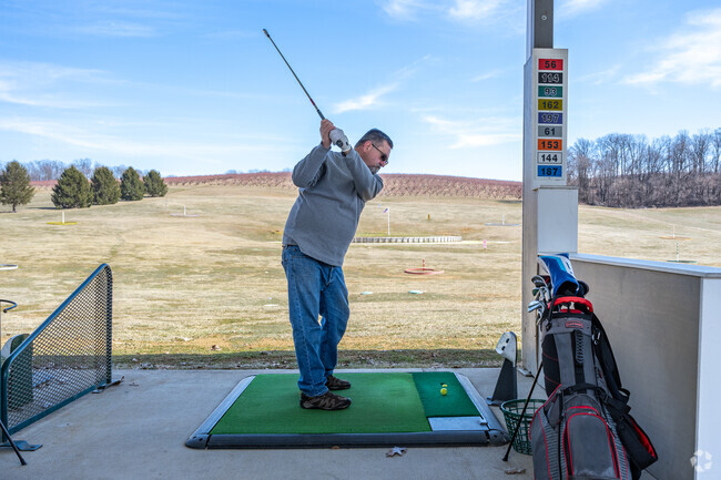 Practice your swing at the driving range in Taneytown.