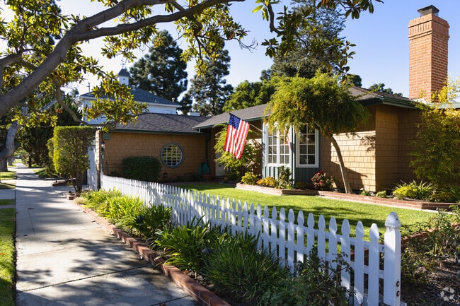 The charming picket fence homes in Coronado offer a perfect blend of coastal beauty.