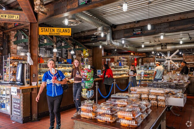 Piece-A-Cake in New Dorp offers display windows chock-full of plump donuts alongside sandwiches.