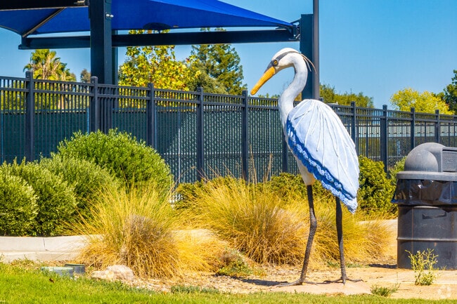 Tuli Memorial Park offers shaded picnic tables and open lawns.