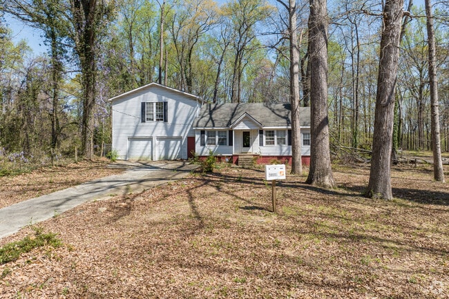 Revovated homes in Hammond Park sit back on lot wooded lots.