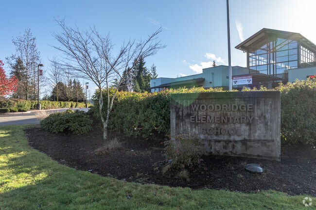 Students arrive at Woodridge Elementary, nestled in Bellevue’s scenic Woodridge area.
