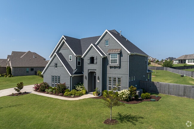 Larger traditional homes in Cave Springs vary in color and design.