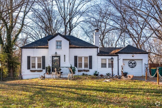 There are larger homes with big yards located along Lewis and Clark Boulevard.