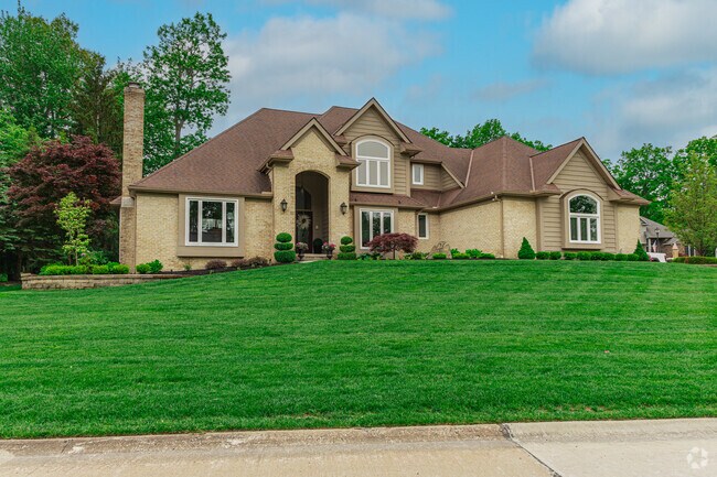 This New Traditional style home is nestled in a quiet, friendly neighborhood that captures the essence of country club living.