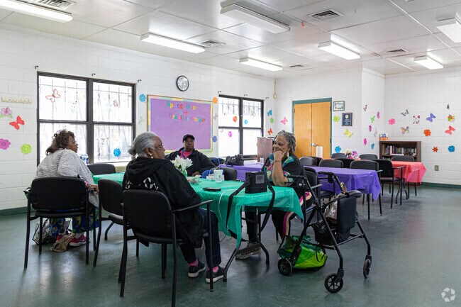 Seniors enjoy daily activities at the Liberty City Community Center.