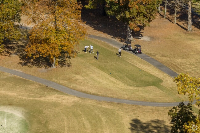 Residents enjoy a challenging round of golf at Sleepy Hole Golf Course.