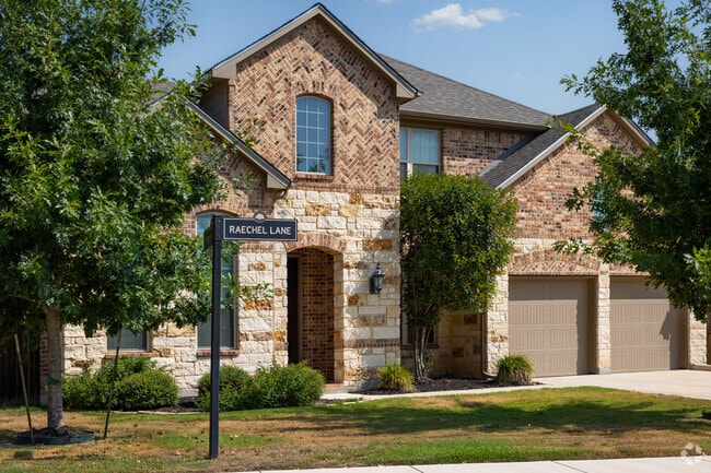 Traditional and national brick homes with some cottage inspired design in Northwest Side.