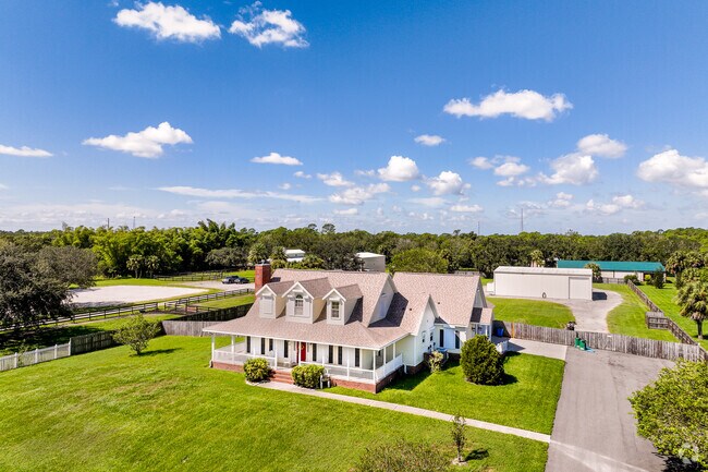 A spacious, Victorian style farm home in a quiet neighborhood of Malabar.