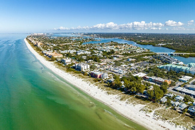 Indian Rocks Beach homes sit on dredged land with boating access and views of the Narrows.