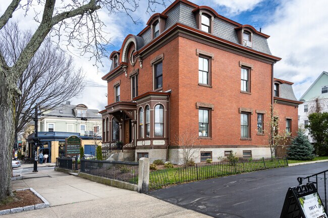 Take pleasure in the sight of stunning red brick colonial homes in Federal Hill, Providence.