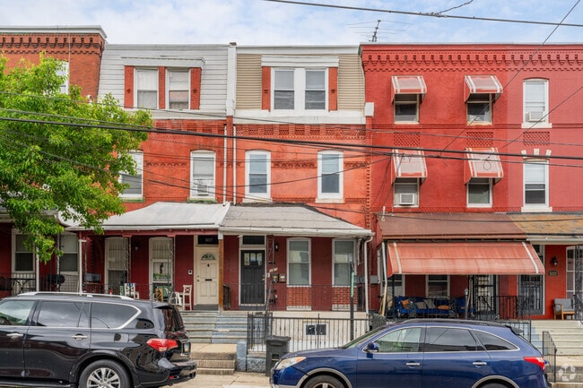 The variety in style of row homes in Mantua resembles the character in the residents.