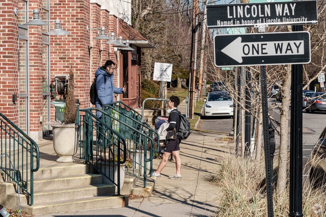 Neighbors stop to chat on the street in the friendly borough of Swarthmore.
