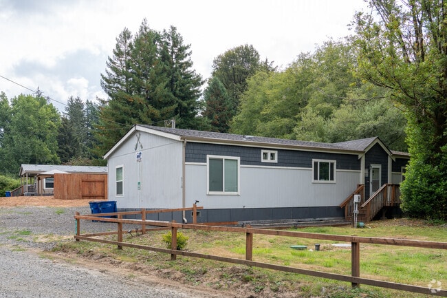 You will find modest homes tucked away from the freeway in the Rose Lodge neighborhood.