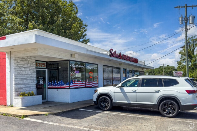 Grab a quick bite at Salmich’s Burgers & Hoagies, minutes from Larrymore Lawns.